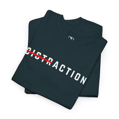 A folded minimalist t-shirt featuring the word "Distraction" with the 'Dist' part crossed out, emphasizing the word 'Action' in a bold font.
