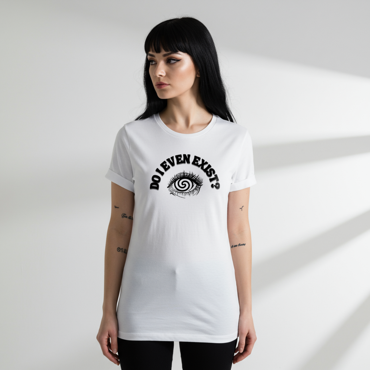 A female model wearing a T-shirt with an eyeball and a mind-bending optical illusion and the text "Do I even exist? 